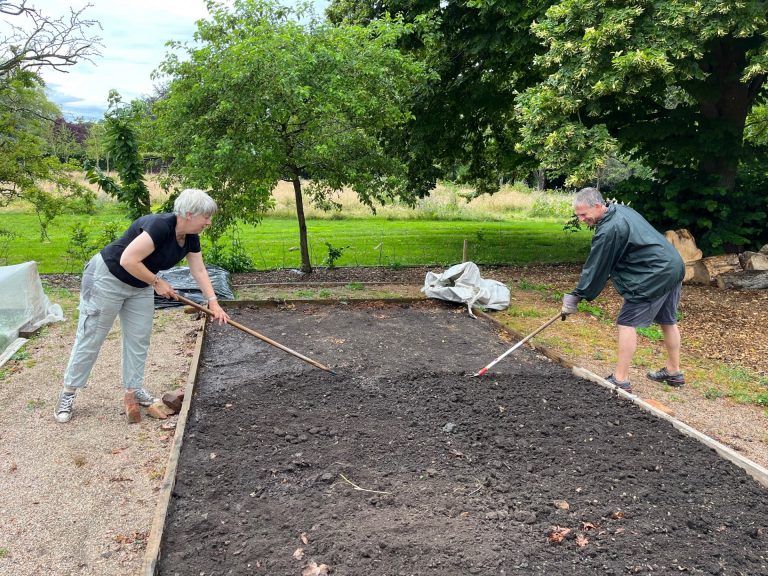 Preparing one of the beds for the next crops